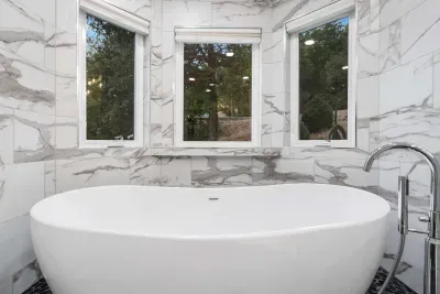 Soak your cares away in the primary ensuite bath