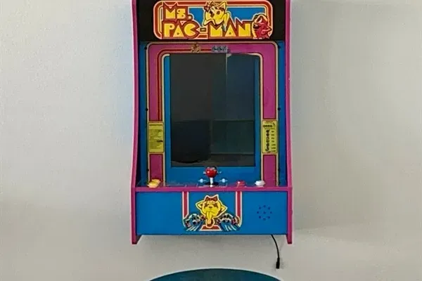 Enjoy a touch of 80s nostalgia with a Mini Ms. Pac-Man arcade game