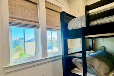 Full-over-full bunk beds with a twin trundle create the perfect sleep space for kids or groups.