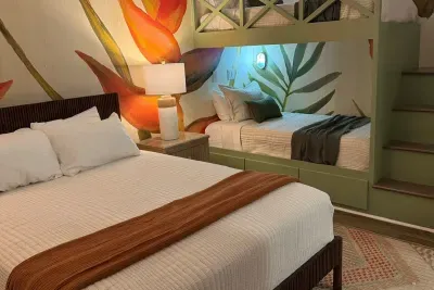 Guest bedroom with queen bed and built-in twin bunks (individual bunk/bulkhead lights featured)