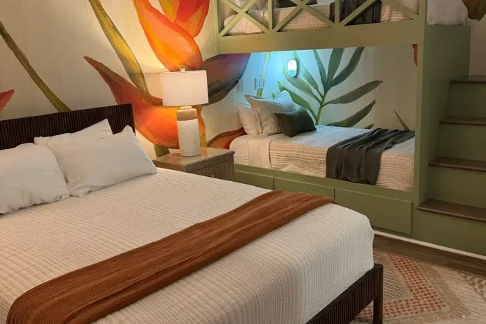 Guest bedroom with queen bed and built-in twin bunks (individual bunk/bulkhead lights featured)