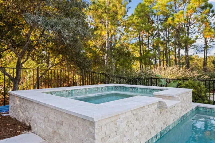 Private spa surrounded by trees