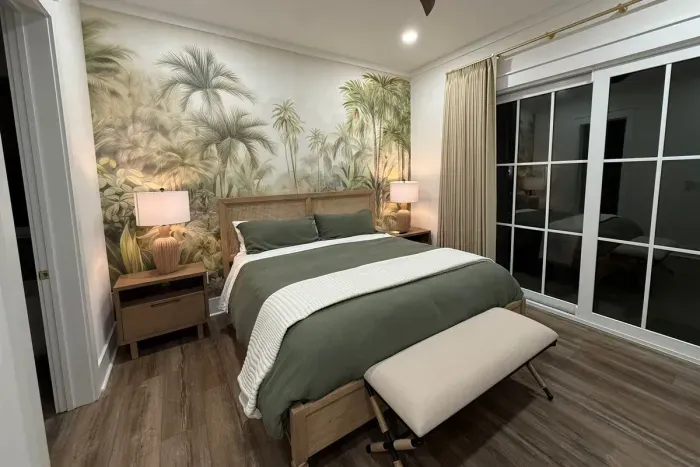 Primary bedroom with king bed and porch access