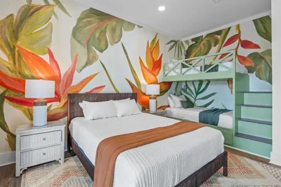 Guest bedroom with queen bed and built-in twin bunks