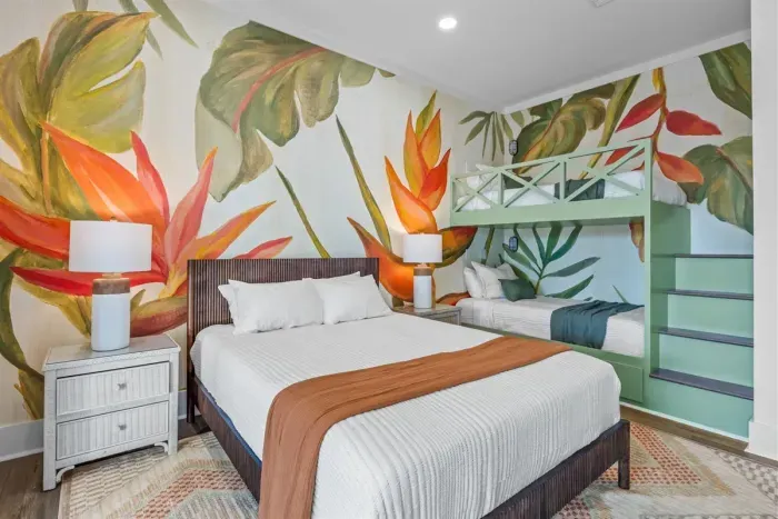 Guest bedroom with queen bed and built-in twin bunks