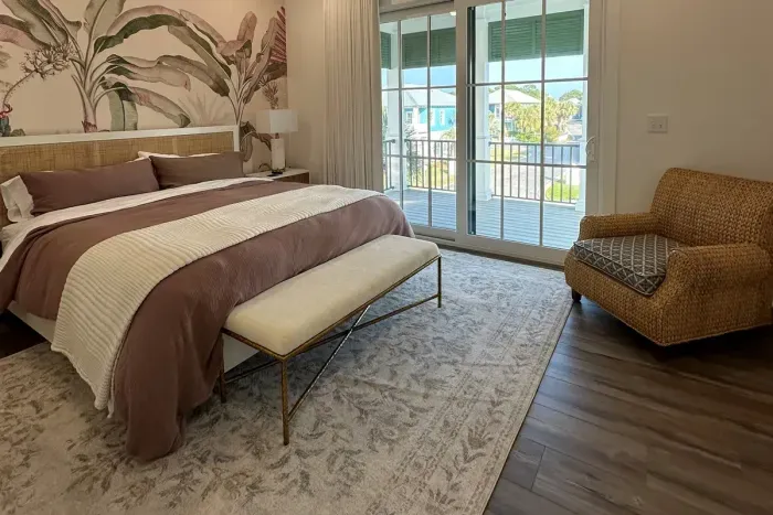 Second primary bedroom with upstairs porch access and seating area