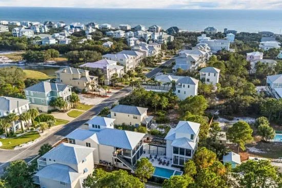 Explore the neighborhood on foot, by bike, or hop the neighborhood golf cart shuttle — pools, palm-lined streets, and the ocean waiting just past the rooftops."