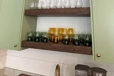 Mix a round of cocktails at the wet bar, or brew a cup of coffee instead — glassware, ice, and a driftwood pelican keeping watch over happy hour or coffee hour alike.