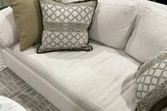 Claim a corner of the sofa for an afternoon nap — the living room's comfort is built for lingering, not just passing through.