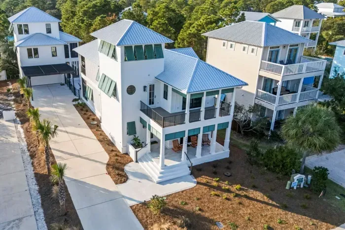 Aerial: front view of both homes