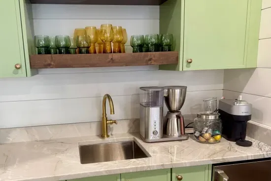 Choose your brew — drip pot or single-serve Nespresso pod — then fill a cooler from the under-counter ice maker on your way out the door.