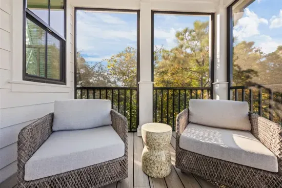 Curl up in a wicker armchair on the porch with your coffee and let the tree canopy do the talking.