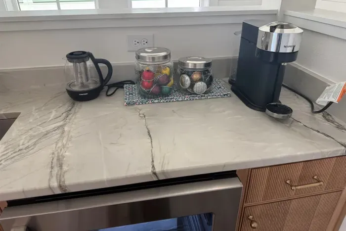 Main house upstairs beverage station with mini-fridge and Nespresso coffee/espresso machine