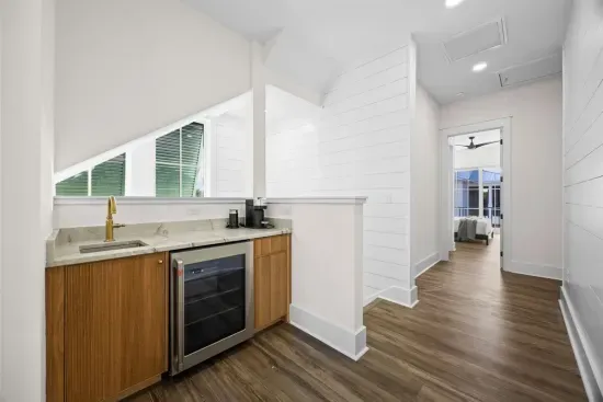 Grab your favorite chilled or hot drink from the upstairs beverage station without a trip downstairs — featuring a refrigerator, Nespresso Vertuo coffee machine, and tea kettle, it's just steps from all three upstairs bedrooms.