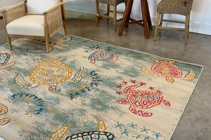 Game room, bistro table and chairs; powder bath (door shown)