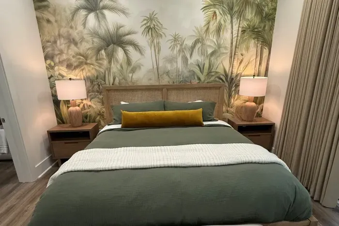 Downstairs master with jungle mural, blackout drapery