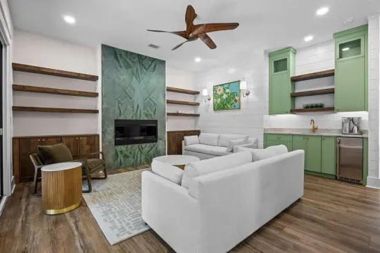 Mix a drink at the wet bar without leaving the fireplace conversation — everything you need for a night in is within reach.