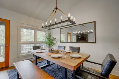 Stunning dining area with patio access comfortably seats 7 - perfect for home cooked meals and game night!