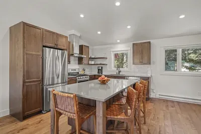 Bright modern kitchen with large island seating for four