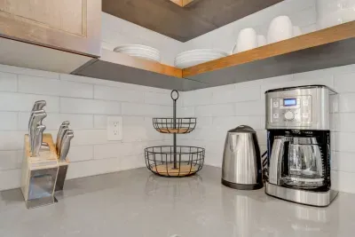 Coffee maker, tea kettle, Ninja blender, toaster are all available for your convenience. Remember to pack your coffee grounds and favorite creamer for that morning pick me up!