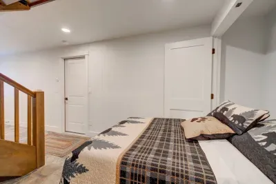 Murphy bed is a full size bed, stocked with extra blankets and pillows!