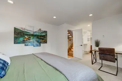 Massive walk in closet with custom shelving and luggage storage - we got the extra blankets tucked away for your snuggly convenience. 