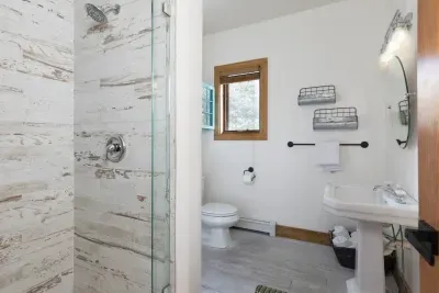 Full bath on first floor for access to supplement upstairs bedrooms