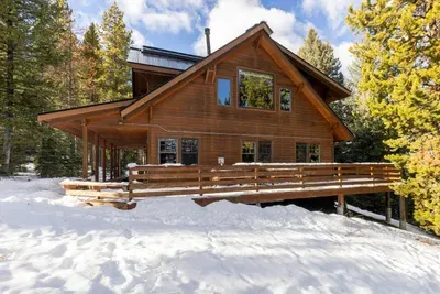 Wrap around porch with 360-degree views of wooded mountains
