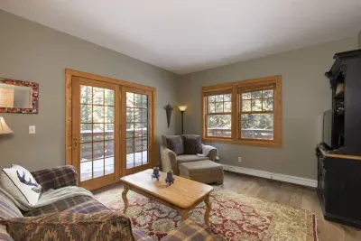 Den has access to patio/hot tub