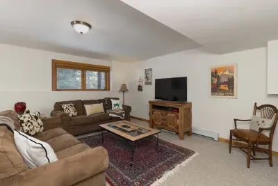 Cozy lower level living space perfect for movie night and playing games on the wifi