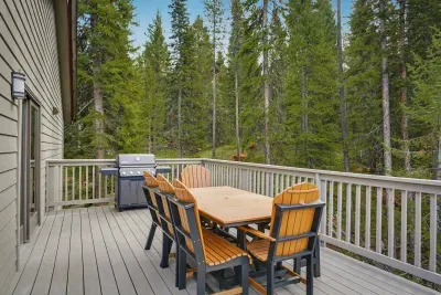 Private forest-view deck with dining for 6 and gas grill