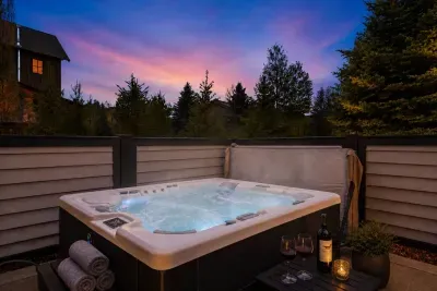 Private hot tub with privacy walls—ideal for après-ski or relaxing summer evenings.