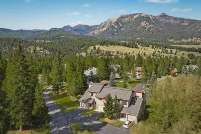 Peaceful mountain retreat surrounded by pines and stunning alpine views