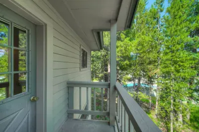 Poolside balcony in the primary bedroom