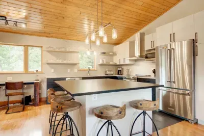 Nice and open kitchen with a HUGE island! Great for breakfast time and to keep an eye on those kiddos!