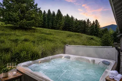 Private hot tub with mountain views—ideal after skiing, hiking, or exploring Big Sky.