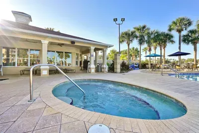Relax at the hot tub at the club house.
