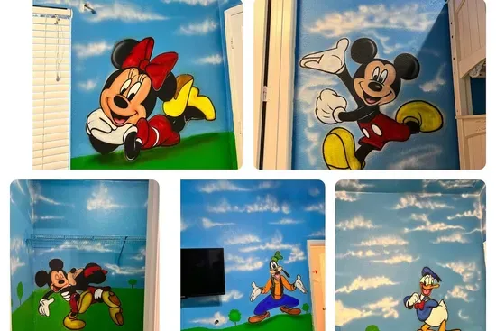 - Disney character mural room featuring Mickey, Minnie, Donald, and Goofy  
- Bright blue sky background creates a fun and immersive themed atmosphere  
- Perfect for kids to enjoy a magical stay filled with color and imagination