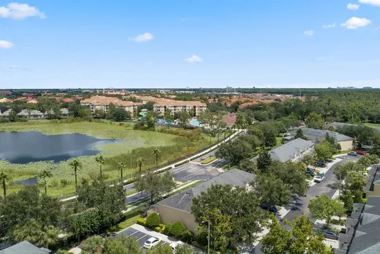 Scenic aerial view of lake and surrounding community.