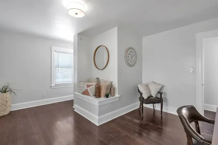 Contemporary and calm, this bedroom has a full-size bed and soothing decor for stress-free nights.
