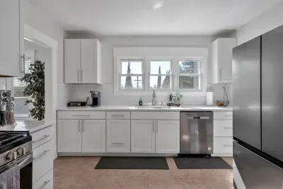Modern conveniences! Gas stove, dishwasher, refrigerator. Kitchen has Keurig coffee maker, toaster, and blender.