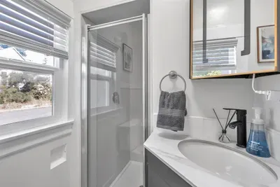Extras like hair dryers and well-lit mirrors provided.