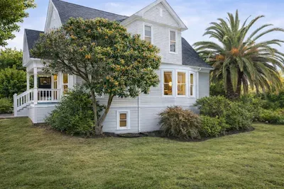Beautifully landscaped and full of character. The exterior features unique architectural details and a spacious lawn, tucked away behind a private gated entrance.