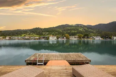 - Stylish dock with loungers offering unobstructed lake and mountain views  
- Perfect location for sunbathing, stargazing, or enjoying a quiet moment  
- Ladder access to the water makes it ideal for swimming on warm days