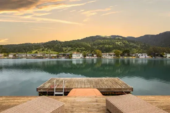 - Stylish dock with loungers offering unobstructed lake and mountain views  
- Perfect location for sunbathing, stargazing, or enjoying a quiet moment  
- Ladder access to the water makes it ideal for swimming on warm days