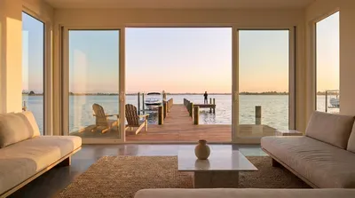 Sunset on the pier from a modern living room