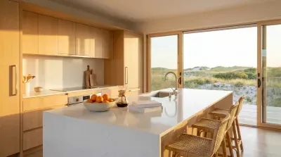 Modern kitchen island with ocean view and beach dunes