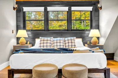 Here we have the 2nd master bedroom, once again fitted with a california king bed, smart TV, and ensuite bathroom!