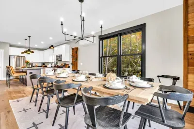 The banquet table and kitchen area flow uninterupted, offering additional seating for guests!