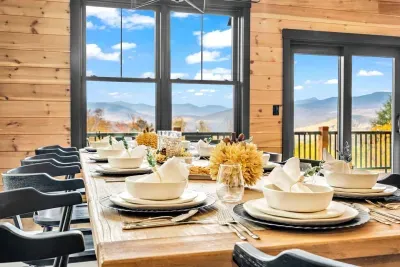 The gorgeous banquet table in the dining space seats 10-12 guests and offers breathtaking views of the surrounding mountains and scenery!